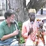 A man and woman sitting next to each other.